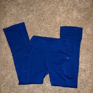 Jaanuu women’s bootcut scrub bottoms. size small. royal blue color